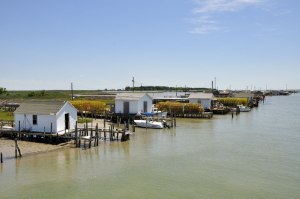 Crabbers sheds on the channel, Tangier Island