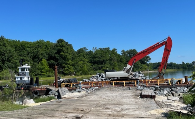 Excavators on York River, Virginia, protect from erosion